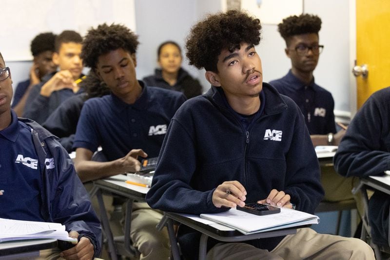 Students listen to Chief Ground Instructor Malcolm Robinson during class at the Aviation Career Enrichment Academy in Atlanta on a Saturday morning . (Steve Schaefer / AJC)
