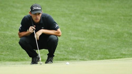 Patrick Cantlay lines up his putt on 16 during the third round of the Masters Tournament Saturday, April 13, 2019, at Augusta National Golf Club in Augusta. Jason Getz / Special to the AJC