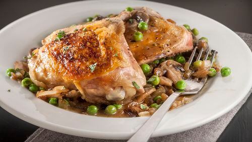 Bold onions, peas and mushrooms unite with mild sauteed chicken in a quick skillet dinner. (Chicago Tribune/Chicago Tribune/TNS)