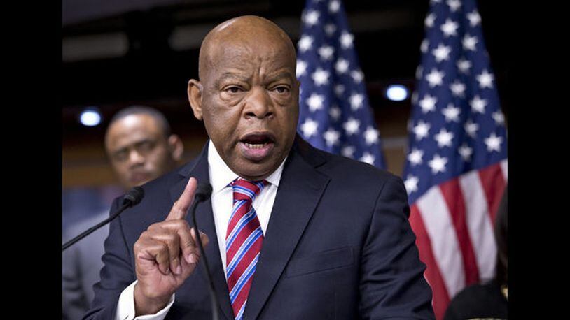 In this June 25, 2013 file photo, Rep. John Lewis, D-Ga., appears on Capitol Hill in Washington.  (AP Photo/J. Scott Applewhite, File)