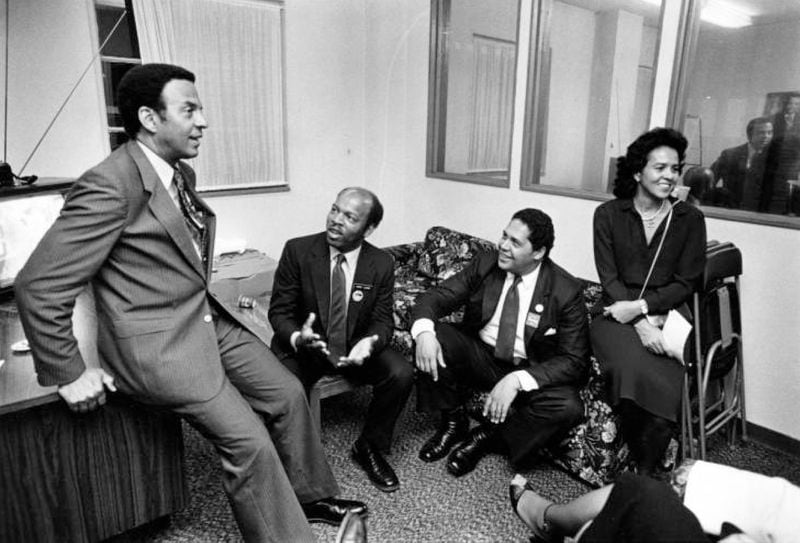 Mayoral candidate Andrew Young discusses the Atlanta election with John Lewis, Mayor Maynard Jackson, and Jean Childs Young, on Election Night, Oct. 7, 1981. In 1982, Stanley Wise, one of Lewis's closest friends, said that Mayor Young was against putting pressure on Lewis over the Great Park plan. “He was adamant that people leave John alone," Wise said. (Jerome McClendon / AJC Archive at GSU Library AJCP549-016b)