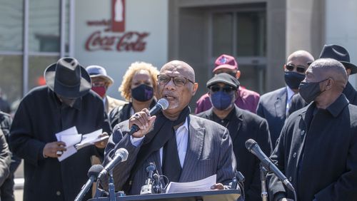 04/01/2021 —Atlanta, Georgia — AME Bishop Reginald T. Jackson makes a statement during a press conference with other religious leaders outside of the World of Coca-Cola in downtown Atlanta, Thursday, April 1, 2021. Bishop Jackson called on people to boycott Coca-Cola, Home Depot and Delta Air Lines because he feels they have not taken a strong stance on SB 202. (Alyssa Pointer / Alyssa.Pointer@ajc.com)