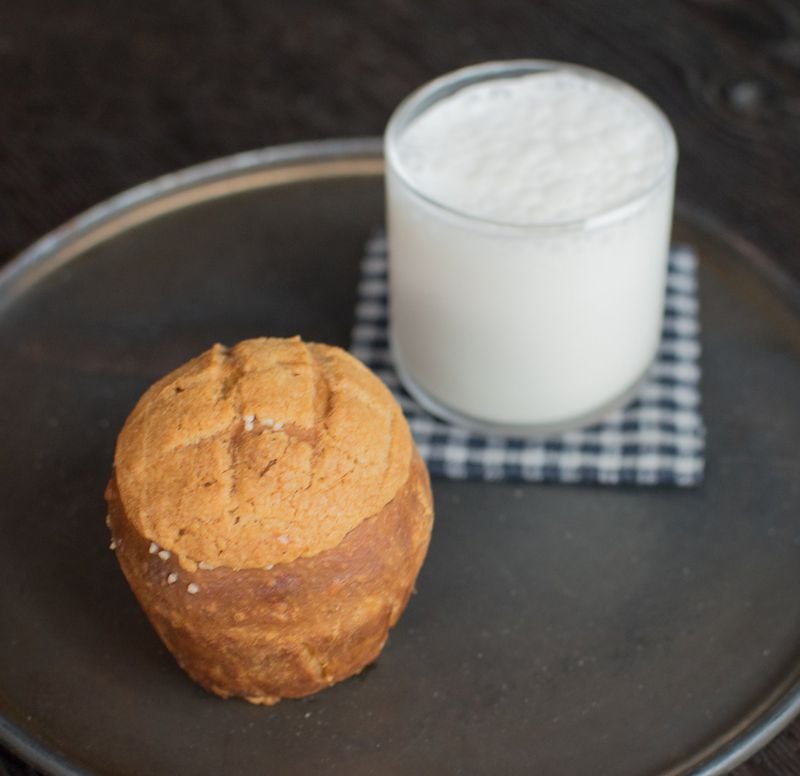 Why you really should save room for dessert: A fourth course at Bacchanalia, the pain au chocolat is paired with sweet, frothy bourbon milk. CONTRIBUTED BY HENRI HOLLIS