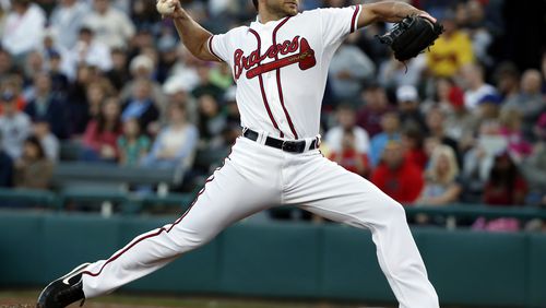 Atlanta Braves starting pitcher Brandon Beachy throws in the first inning of a spring exhibition baseball game against the Houston Astros, Friday, Feb. 28, 2014, in Kissimmee, Fla. (AP Photo/Alex Brandon)