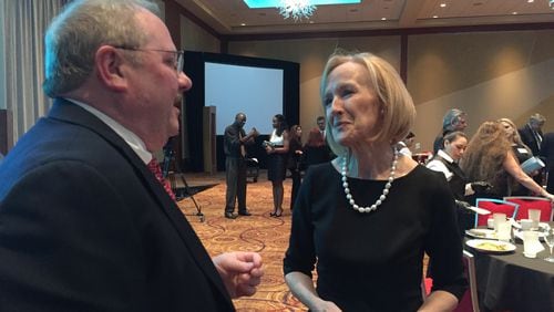 Fellow 2016 Atlanta Press Club Hall of Fame inductees Judy Woodruff and Budd McEntee talk after the ceremony November 30, 2016. CREDIT: Rodney Ho/ rho@ajc.com