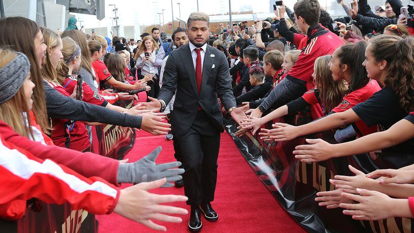 Atlanta United forward Josef Martinez is greeted by fans on the red carpet arriving to play the New York Red Bulls in their Eastern Conference finals MLS soccer game on Sunday, Nov. 25, 2018, in Atlanta.   Curtis Compton/ccompton@ajc.com
