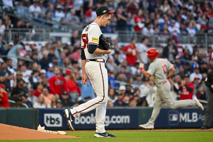 Atlanta Braves starting pitcher Max Fried (54) reacts as Philadelphia Phillies' J.T. Realmuto rounds third base on a home run during the third inning of the NLDS Game 2 in Atlanta on Monday, Oct. 9, 2023.   (Hyosub Shin / Hyosub.Shin@ajc.com)
