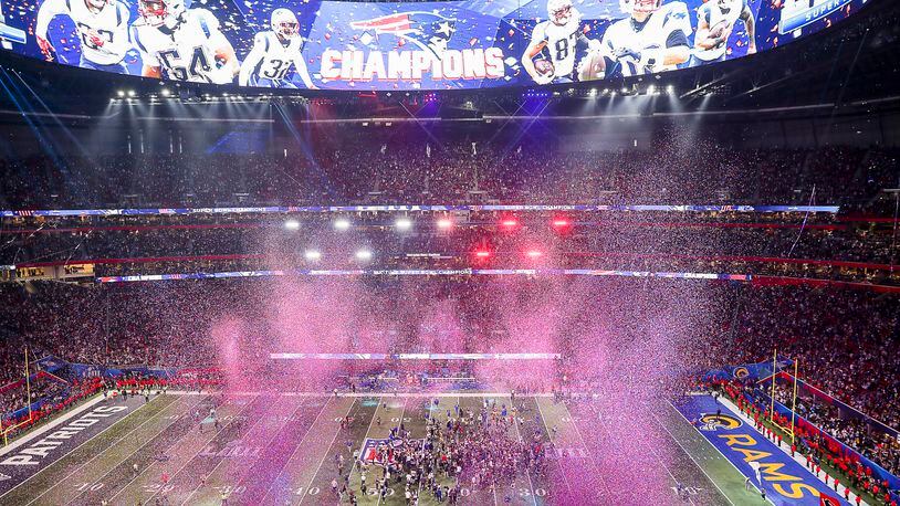 Confetti falls onto the field after Super Bowl LIII.