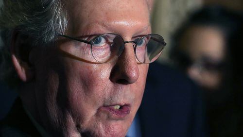 Mitch McConnell could pull a Harry Reid if Senate Democrats push too hard against President Trump's Supreme Court nominee. (Mark Wilson / Getty Images)