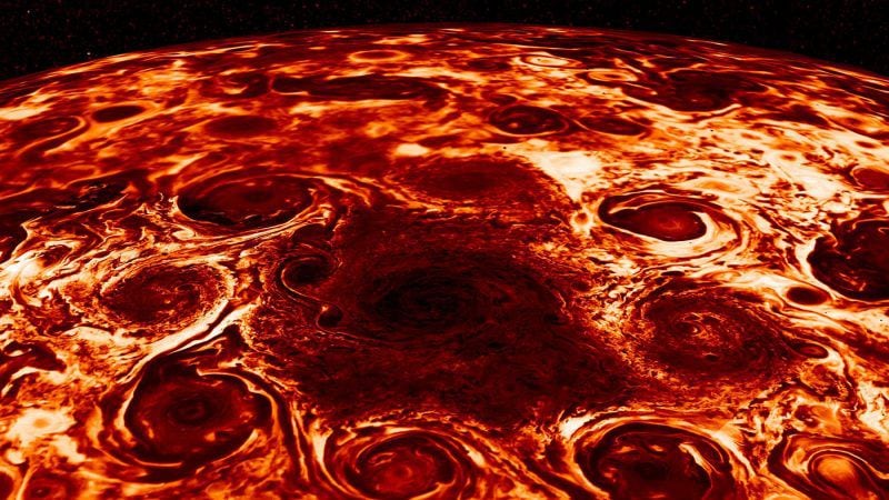 Composite infrared image from Juno of clusters of massive cyclones surrounding Jupiter’s north pole.