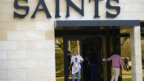 Members of SNAP, the Survivors Network of those Abused by Priests, including Richard Windmann, hold signs in front of the New Orleans Saints training facility in Metairie, Louisiana. The pro football team acknowledged last week that its front office helped church leaders deal with the public relations fallout that followed the publishing a list of local clergymen the archdiocese deemed “credibly accused” of sexually abusing children.