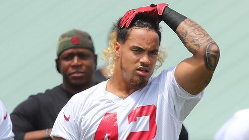 Falcons rookie linebacker Duke Riley, LSU, prepares to stretch during warmups at rookie mini-camp on Friday, May 12, 2017, in Flowery Branch.    Curtis Compton/ccompton@ajc.com