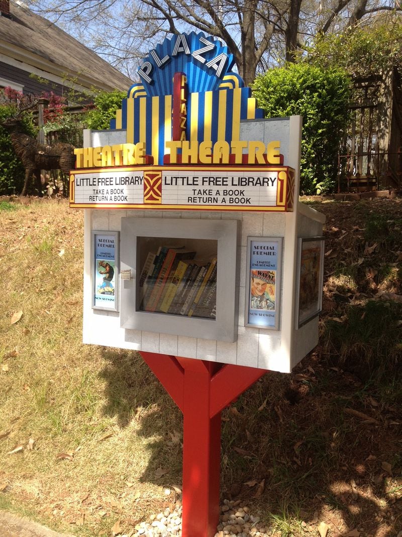 Years before he built the 'Little Fox' free library, Rick Schroeder made one that was a replica of the Plaza Theatre. It stood outside his Grant Park home for about six years before weather conditions deteriorated it to the point it had to be taken down. PHOTO: Rick Schroeder