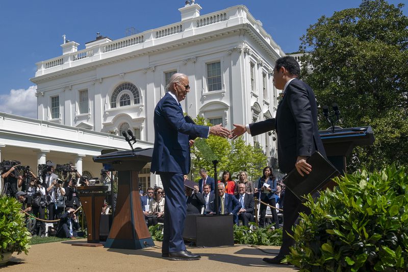 President Joe Biden, left, and Japanese Prime Minister Fumio Kishida shake hands after a news conference in the Rose Garden of the White House, Wednesday, April 10, 2024, in Washington. (AP Photo/Alex Brandon)