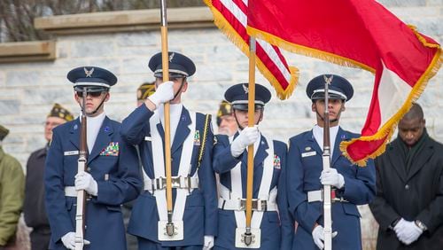 11/12/2019 -- Canton, Georgia -- Members of the Air Force R.O.T.C. program at Sequoyah High School post the colors during a veterans internment ceremony provided by the Dignity Memorial Program at the Georgia National Cemetery in Canton, Tuesday, November 12, 2019. The Dignity Memorial program honors the lives of homeless or indigent United States veterans whose remains are not claimed. Tuesday's funeral honored the lives of seven United States World War II veterans. (Alyssa Pointer/Atlanta Journal Constitution)