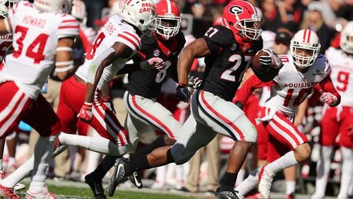 The Georgia Bulldogs last wore black jerseys when Nick Chubb was still a junior running back and scored two touchdowns in a win against Louisiana-LaFayette on Nov. 19, 2016 (Curtis Compton / ccompton@ajc.com)
