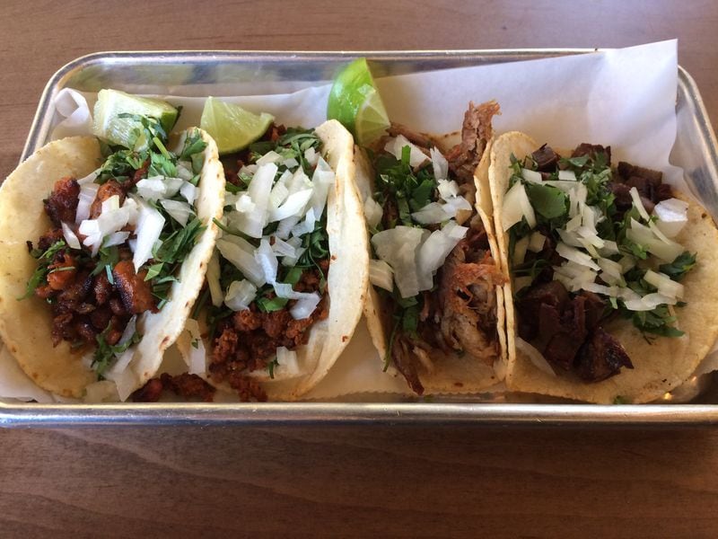 Though La Mixteca is a tamale place, it also serves street tacos with a number of meaty filings, like this assortment with al pastor, chorizo, carnitas and lengua. CONTRIBUTED BY WENDELL BROCK