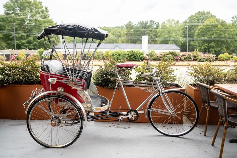 Rickshaw Thai Street Food has a rickshaw out front. (Mia Yakel for The Atlanta Journal-Constitution)
