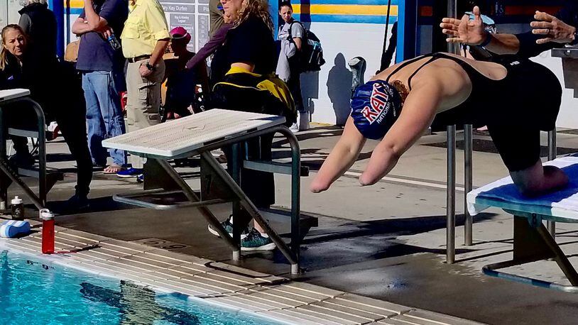 Aimee Copeland dives off the starting blocks during warmups last month at the Paralympic National Swimming Championships in Tucson, Ariz. CONTRIBUTED