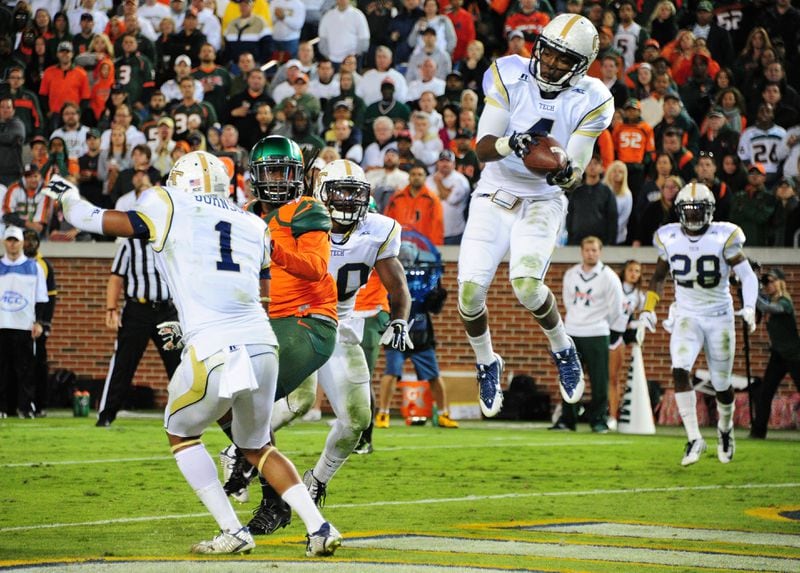 Defensive back Jamal Golden: He leaps to secure a game-clinching interception against Miami at Bobby Dodd Stadium on Oct. 4, 2014. (Photo by Scott Cunningham/Getty Images)