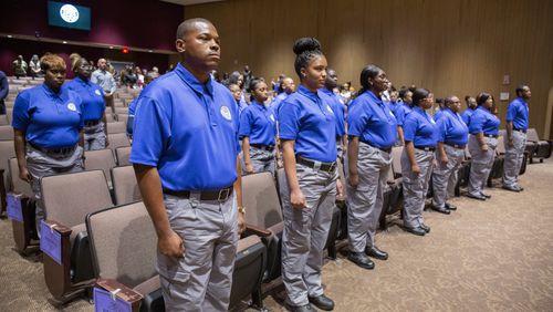Graduates stand during a Georgia Department of Juvenile Justice ceremony. The department's officers received $5,000 raises last year and could see an addition pay bump of $2,000 this year. A veteran of nearly nine years with the department said last year's raise made a big difference. “Before the raise, I had issues of robbing Peter to pay Paul. Do I buy groceries or pay this bill?" said Lt. Brenda Monroe of the Augusta Youth Development Campus. “The raise has gotten me out of that line of thinking.”
