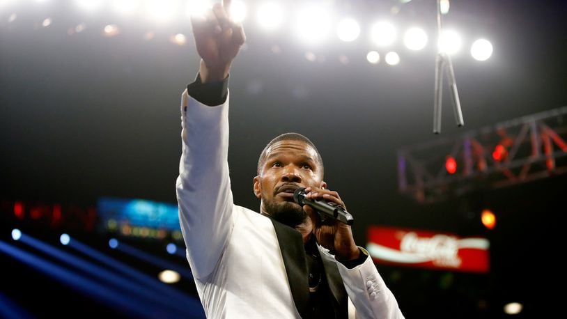LAS VEGAS, NV - MAY 02: Jamie Foxx sings the national anthem of the United States of America before the welterweight unification championship bout between Floyd Mayweather Jr. and Manny Pacquiao on May 2, 2015 at MGM Grand Garden Arena in Las Vegas, Nevada. (Photo by Al Bello/Getty Images) LAS VEGAS, NV - MAY 02: Jamie Foxx sings the national anthem of the United States of America before the welterweight unification championship bout between Floyd Mayweather Jr. and Manny Pacquiao on May 2, 2015 at MGM Grand Garden Arena in Las Vegas, Nevada. (Photo by Al Bello/Getty Images)