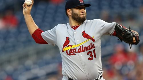 Lance Lynn pitches for the St. Louis Cardinals against the Braves tonight. (Photo by Patrick Smith/Getty Images)