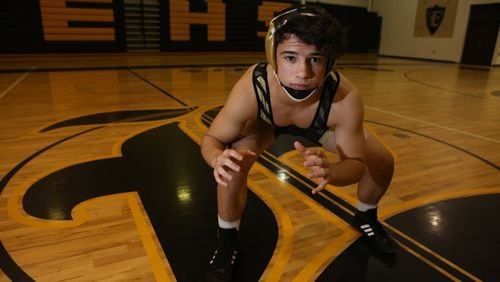 Drew Eller, who has been wrestling since the age of six, poses for a portrait in the Evans High School gym in Augusta, Georgia, on May 3, 2017. Eller moved to Augusta from Colorado, where the wrestling scene is much more competitive. He went undefeated in the 2016 season and won his weight class as a freshman, making him the first from the Central Savannah River Area (CSRA) to do so. (HENRY TAYLOR / HENRY.TAYLOR@AJC.COM)