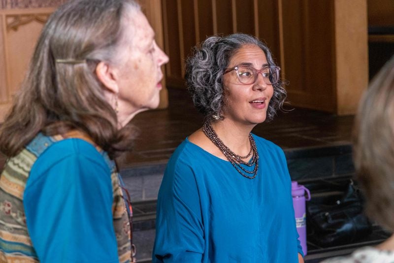 Voices of Love Threshold Choir members Annamay Keeney and Shonali Banerjee practice with the group at Emory Presbyterian Church in Decatur. PHIL SKINNER FOR THE ATLANTA JOURNAL-CONSTITUTION
