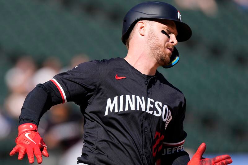Minnesota Twins' Ryan Jeffers runs after hitting a two-run double during the ninth inning of a baseball game against the Chicago White Sox in Chicago, Wednesday, May 1, 2024. (AP Photo/Nam Y. Huh)