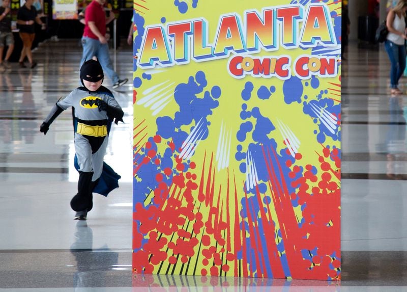 Lelane Dodson, 5,  heads toward the Atlanta Comic Con in the Georgia World Congress Center Sunday, July 2018.  STEVE SCHAEFER / SPECIAL TO THE AJC