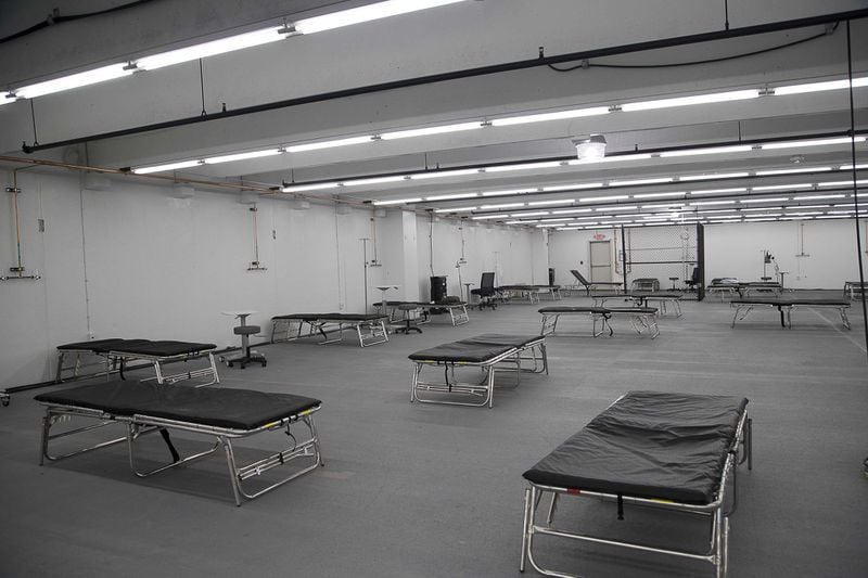 Hundreds of beds will be available for patients inside of a newly constructed pop-up hospital located in the parking garage at Floyd Medical Center in Rome. (ALYSSA POINTER / ALYSSA.POINTER@AJC.COM)