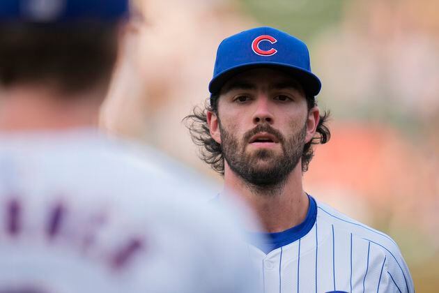 Chicago Cubs' Dansby Swanson warms up before a baseball game against the Atlanta Braves, Tuesday, May 21, 2024, in Chicago. (AP Photo/Erin Hooley)