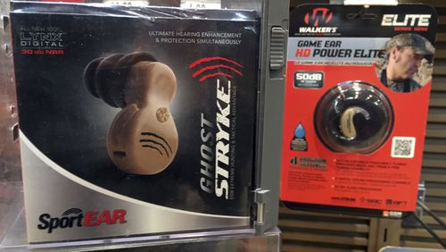 Hearing enhancement devices, which are also popular with hunters, are displayed at a hunting store in Scarborough, Maine. The group Guns Owners of America says a push by U.S. Sens. Elizabeth Warren, Charles Grassley, Maggie Hassan, Johnny Isakson and Susan Collins to get more hearing aids to people is not about hearing aids at all. It calls the legislation a covert attempt to get more regulation of firearm products such as hearing enhancement devices used by hunters.