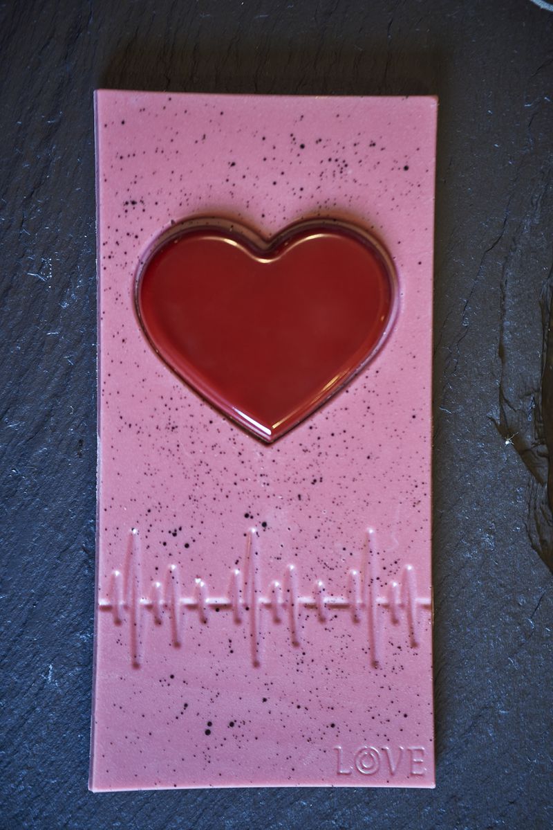For Valentine’s Day, Temo Foods is offering a raspberry ruby chocolate bar with a candied pistachio dark chocolate heart. Courtesy of Kyle Reynolds