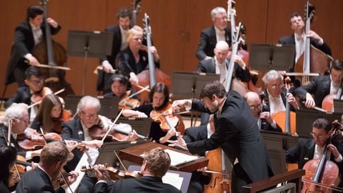 Assistant conductor Stephen Mulligan leads the Atlanta Symphony Orchestra. CONTRIBUTED BY JEFF ROFFMAN