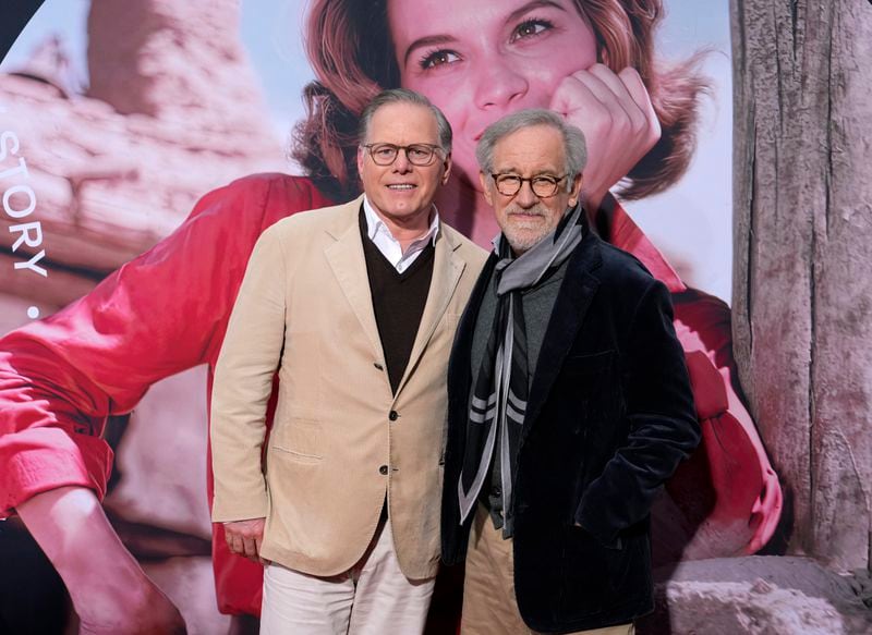 David Zaslav, left, president and CEO of Warner Bros. Discovery, poses with director Steven Spielberg at the premiere of a 4K restoration of the 1959 film "Rio Bravo" on the opening night of the 2023 TCM Classic Film Festival, Thursday, April 13, 2023, at the TCL Chinese Theatre in Los Angeles. (AP Photo/Chris Pizzello)