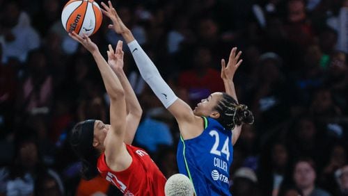 Atlanta Dream guard Aerial Powers (left) attempts to shot against Minnesota Lynx forward Napheesa Collier (24) during the second half at Gateway Center Arena, Sunday, May 26, 2024, in Atlanta.

(Miguel Martinez / AJC)