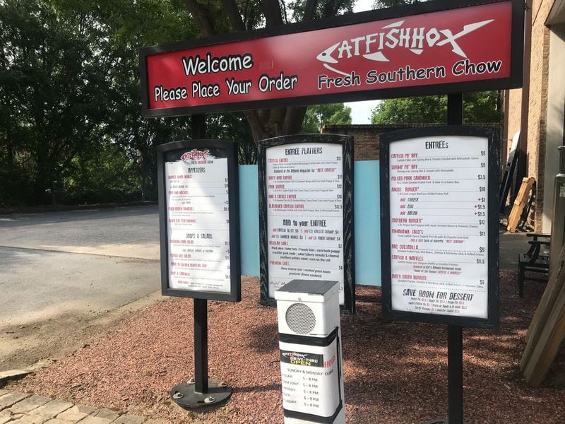 Catfish Hox is located at 2595 Sandy Plains Road in a nondescript strip mall in east Cobb. Although the dining room remains closed because of the coronavirus, the restaurant offers takeout via a drive-thru. LIGAYA FIGUERAS / LIGAYA.FIGUERAS@AJC.COM