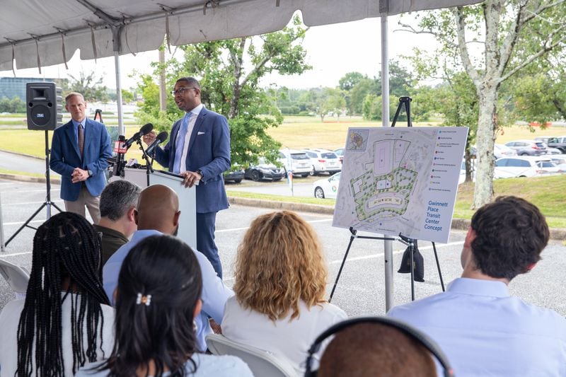 Assistant Secretary of Transportation Christopher Coes takes questions at the Gwinnett County celebration a $20 million federal grant Monday, July 24, 2023 awarded to transform the transit center just west of Gwinnett Place Mall.  (Jenni Girtman for The Atlanta Journal-Constitution)