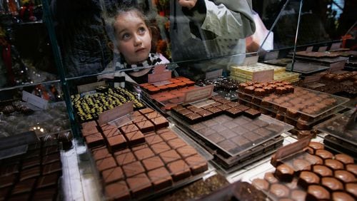 NEW YORK - APRIL 05: A girl looks over chocolates in a case at Jacques Torres Chocolate April 5, 2007 in the Soho neighborhood of New York City. New York City. (Photo by Chris Hondros/Getty Images)