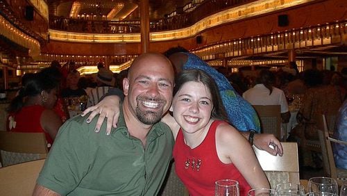 Drew Crecente and daughter, Jennifer (14) on a 7-day cruise of the western Caribbean (Carnival Pride) at dinner on July 23, 2002.