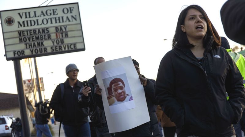 Protesters rally for Jemel Roberson on Tuesday, Nov. 13, 2018, outside the Midlothian Police Department in Midlothian, Ill. Roberson, 26, was shot and killed by a Midlothian police officer Sunday, Nov. 11 as he subdued a gunman who walked into the bar where Roberson worked security and opened fire. Four people, including the alleged gunman, were injured.