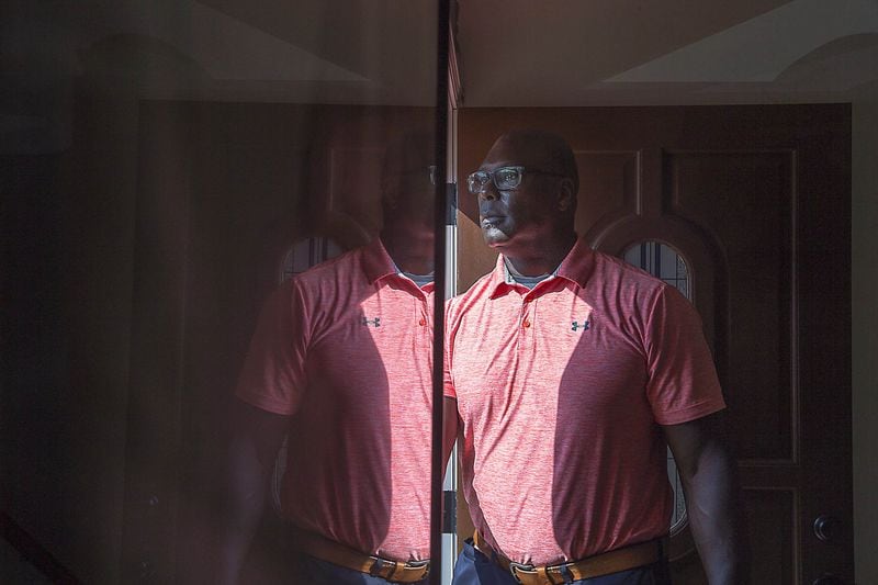 Former NFL San Diego Chargers player Maurice Harrell at his residence in Decatur on July 2. he is having trouble finding a job in his field, sports management. (Alyssa Pointer/alyssa.pointer@ajc.com)