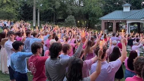 Students hold candles at a vigil to honor the life of Marietta High student Liv Teverino, who was killed in a car accident on Monday. The vigil took place at Marietta First United Methodist Church on Wednesday, Sept. 20, 2023. (Courtesy of Sarah Bullington)