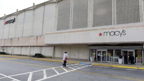 A woman walks into the now-closed Macy's at North DeKalb Mall in 2015. Company officials announced Tuesday that the Macy’s at The Gallery at South DeKalb will close this year.