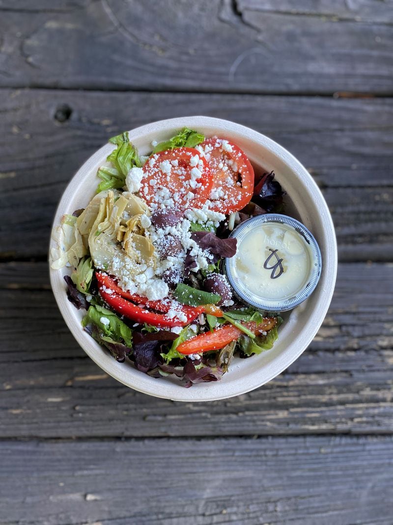Ammazza offers this beautiful insalata di basil as takeout; you can buy 8 ounces of the creamy basil dressing from the restaurant for $5. Wendell Brock for The Atlanta Journal-Constitution