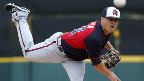 Atlanta Braves starting pitcher Kris Medlen (54) warms up before the first inning of an exhibition spring training baseball game against the Detroit Tigers in Lakeland, Fla., Thursday, Feb. 27, 2014. The Tigers won 5-2. (AP Photo/Gene J. Puskar) Braves will seek a second opinion before determining whether Kris Medlen needs Tommy John surgery again.