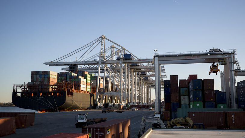 Trade is crucial for the state’s economy, with tens of thousands of jobs dependent on the global commerce. Ships unload containers at Georgia Ports Authority’s Port of Savannah in this 2018 photo. (AP Photo/Stephen B. Morton, File)