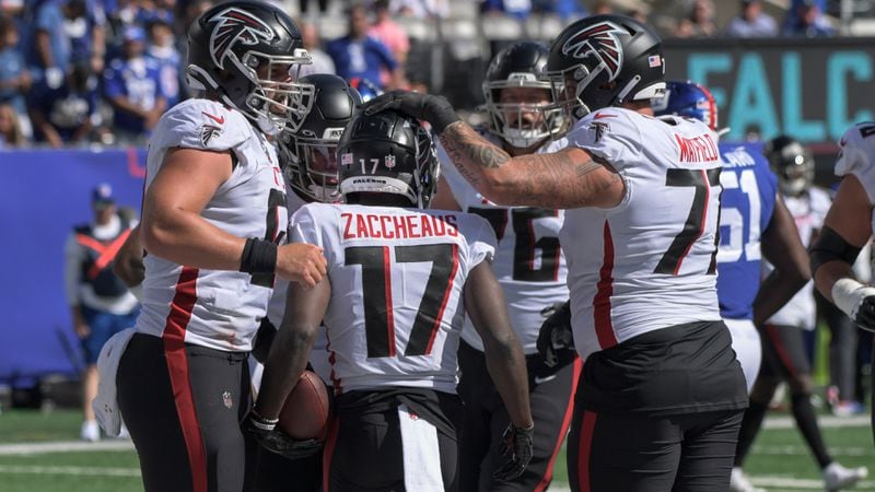 Falcons wide receiver Olamide Zaccheaus (17) celebrates with his teammates after scoring a touchdown during the first half against the New York Giants, Sunday, Sept. 26, 2021, in East Rutherford, N.J. (Bill Kostroun/AP)